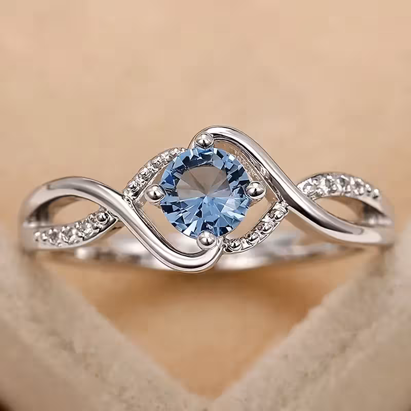 A Minimalist Wave-shaped Blue Synthetic Zirconia Ladies' Ring For Parties, Dances, Daily Wear, And Jewelry Gifts.