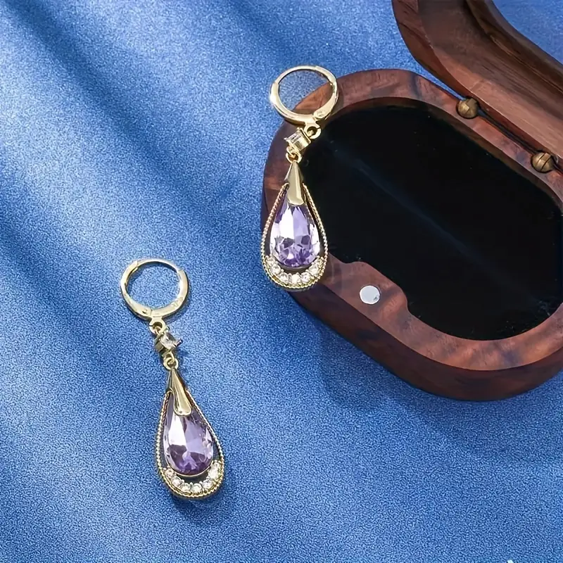1 Pair Of Fashionable Purple Artificial Crystal Water Droplet Shaped Hollow Earrings for Women